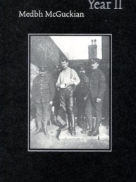 book cover with man standing in the middle of soldiers guarding him